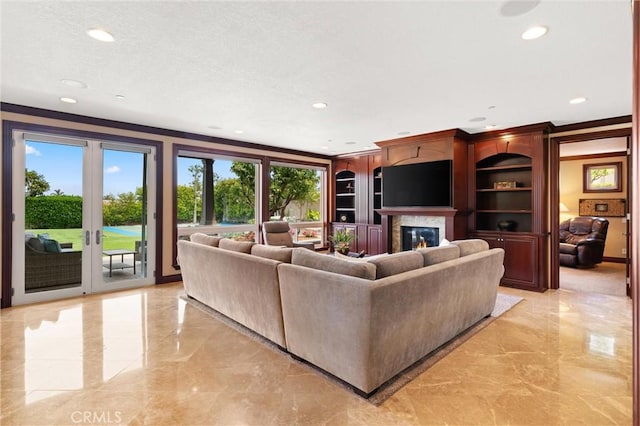 18912 Rockinghorse Ln, Huntington Beach, CA 92648 - living room featuring ornamental molding, light marble finish floors, a fireplace, recessed lighting, and french doors