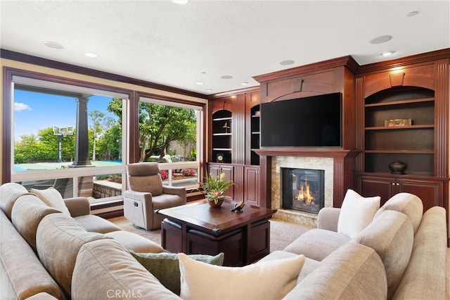 18912 Rockinghorse Ln, Huntington Beach, CA 92648 - living area with a fireplace, crown molding, and built in shelves