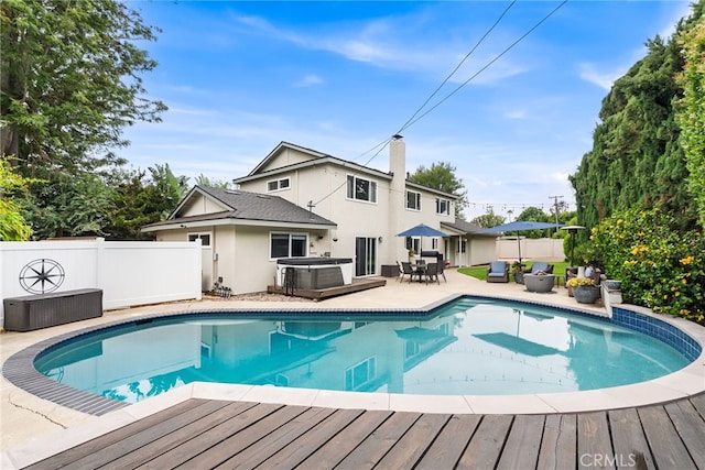 1161 Ravencrest Rd, North Tustin, CA 92705 - view of pool featuring a hot tub, a wooden deck, and a patio area