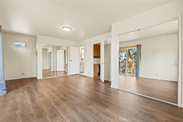 490 Vilas Rd, Chico, CA 95973 - unfurnished bedroom featuring dark wood finished floors and baseboards