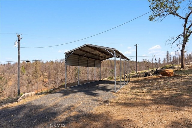 490 Vilas Rd, Chico, CA 95973 - view of outdoor structure with a carport and driveway