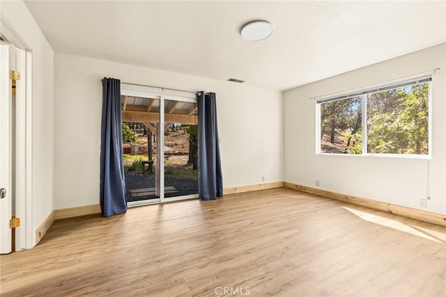 490 Vilas Rd, Chico, CA 95973 - empty room featuring wood finished floors and baseboards