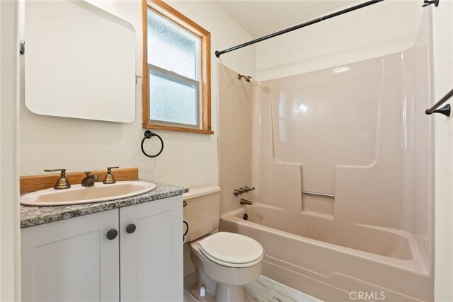 490 Vilas Rd, Chico, CA 95973 - bathroom featuring toilet, vanity, and bathing tub / shower combination