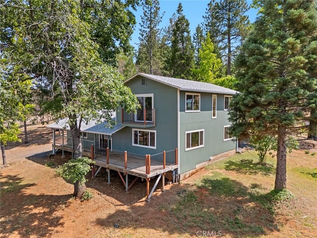 490 Vilas Rd, Chico, CA 95973 - rear view of property with a wooden deck and a shingled roof