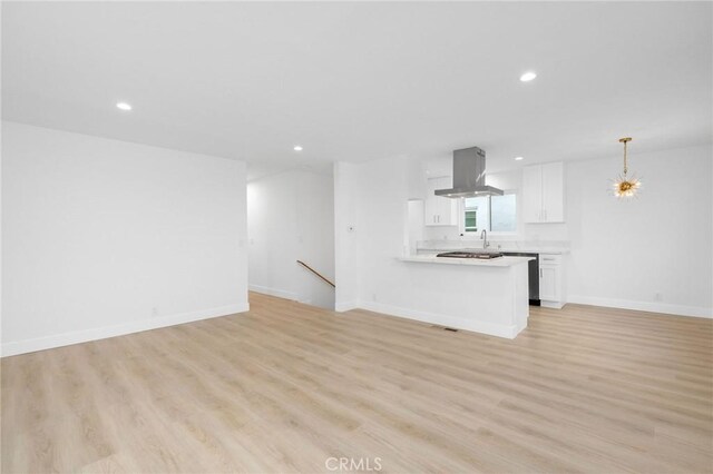 217 43rd St, Manhattan Beach, CA 90266 - unfurnished living room with recessed lighting, light wood-style floors, baseboards, and a sink