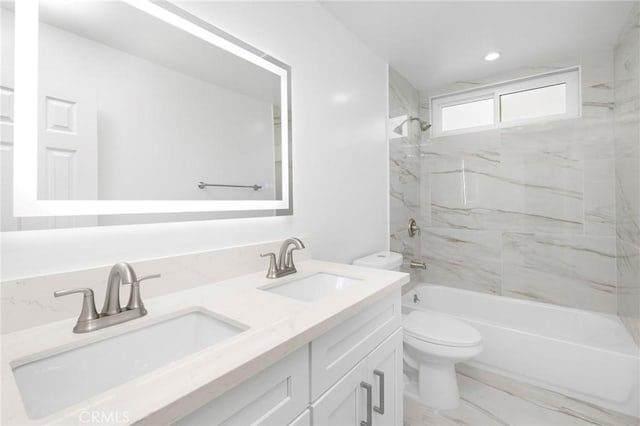 217 43rd St, Manhattan Beach, CA 90266 - full bath with toilet, double vanity, washtub / shower combination, and marble finish floors