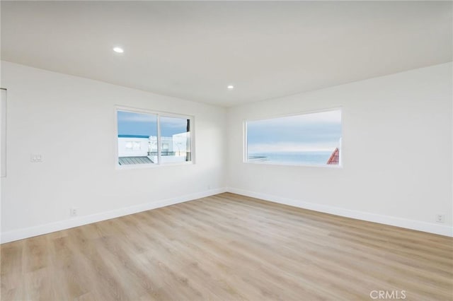 217 43rd St, Manhattan Beach, CA 90266 - unfurnished room with light wood finished floors, baseboards, and recessed lighting