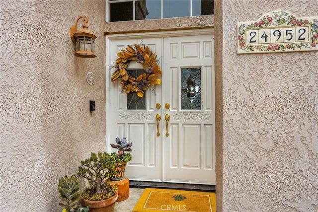 24952 Eaton Ln, Laguna Niguel, CA 92677 - property entrance featuring stucco siding