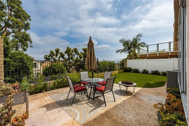 24952 Eaton Ln, Laguna Niguel, CA 92677 - fenced backyard with a patio, outdoor dining area, and an outdoor fire pit