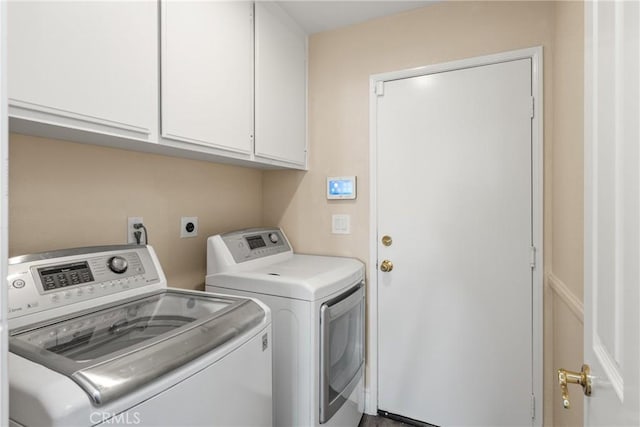 24952 Eaton Ln, Laguna Niguel, CA 92677 - washroom with cabinet space and washing machine and dryer