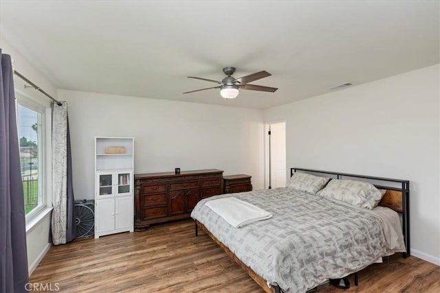 22554 Pico St, Grand Terrace, CA 92313 - bedroom with wood finished floors, baseboards, and ceiling fan