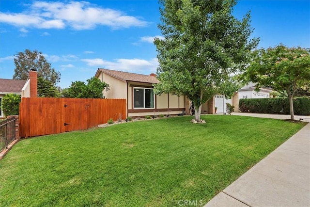 22554 Pico St, Grand Terrace, CA 92313 - view of front facade featuring stucco siding and a gate