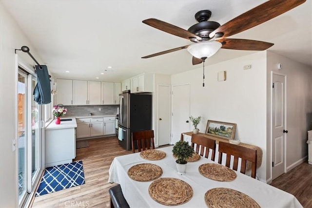 22554 Pico St, Grand Terrace, CA 92313 - dining area featuring light wood-style floors, ceiling fan, recessed lighting, and baseboards