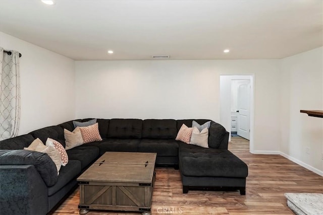 22554 Pico St, Grand Terrace, CA 92313 - living area with wood finished floors, recessed lighting, and baseboards
