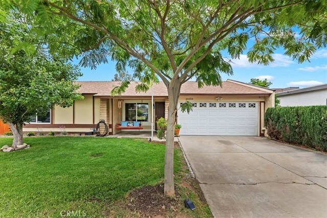 22554 Pico St, Grand Terrace, CA 92313 - ranch-style house with an attached garage, concrete driveway, and a front yard