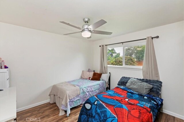 22554 Pico St, Grand Terrace, CA 92313 - bedroom with wood finished floors, baseboards, and a ceiling fan