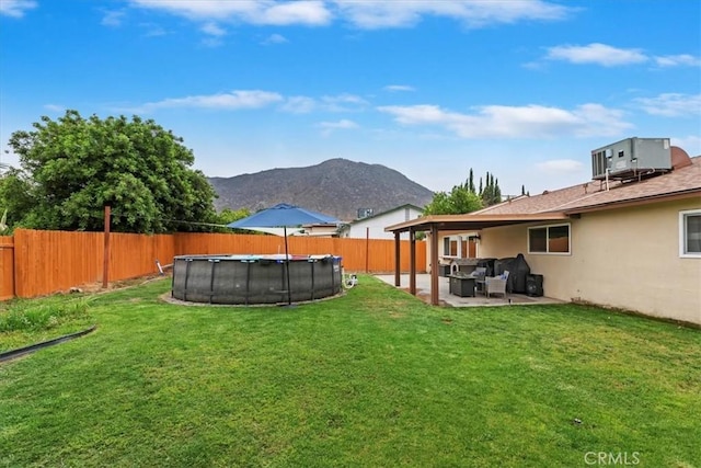 22554 Pico St, Grand Terrace, CA 92313 - view of yard featuring a mountain view and a patio area