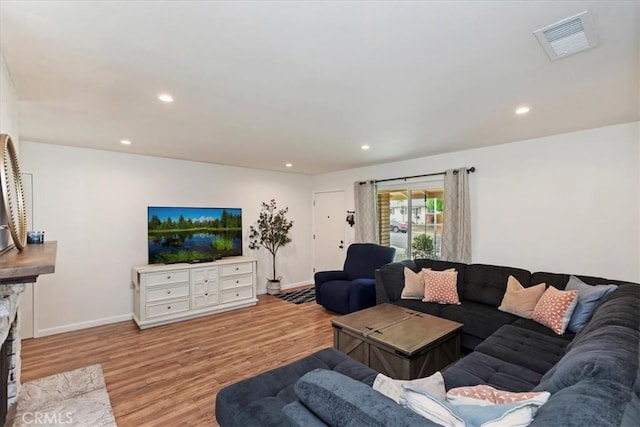 22554 Pico St, Grand Terrace, CA 92313 - living area with light wood-style floors, baseboards, and recessed lighting