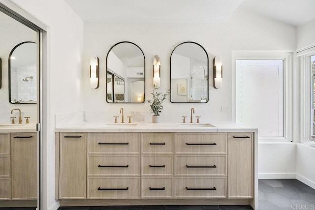 5233 Belardo Dr, San Diego, CA 92124 - full bathroom with double vanity and baseboards