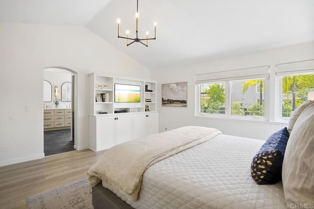 5233 Belardo Dr, San Diego, CA 92124 - bedroom featuring a chandelier, light wood finished floors, arched walkways, multiple windows, and high vaulted ceiling