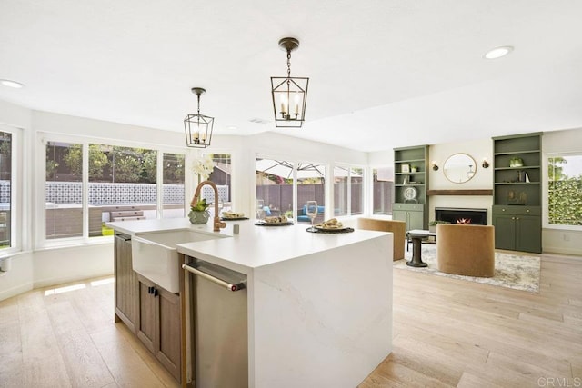 5233 Belardo Dr, San Diego, CA 92124 - kitchen featuring dishwasher, light wood-type flooring, healthy amount of natural light, and recessed lighting