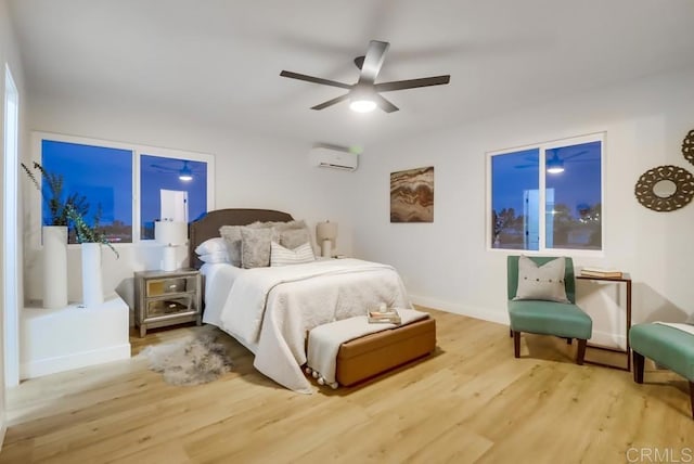3776 Enero Ct, San Diego, CA 92154 - bedroom with wood finished floors, a wall mounted air conditioner, baseboards, and ceiling fan
