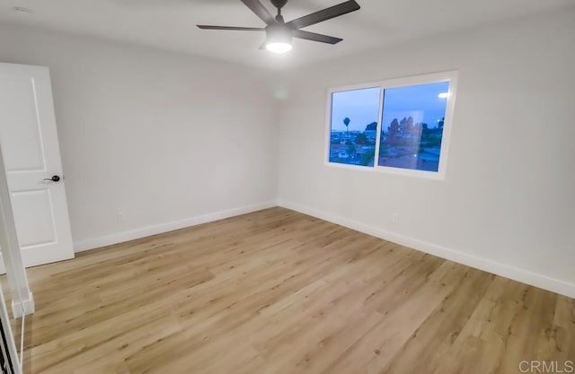 3776 Enero Ct, San Diego, CA 92154 - empty room with ceiling fan, baseboards, and light wood finished floors