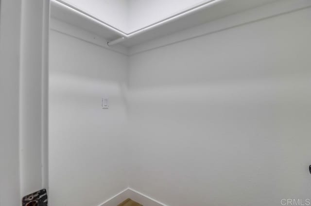 3776 Enero Ct, San Diego, CA 92154 - laundry area featuring baseboards