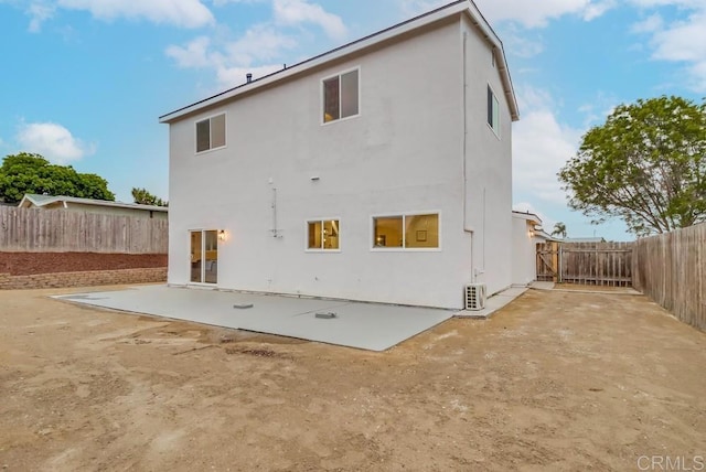 3776 Enero Ct, San Diego, CA 92154 - rear view of house with a patio, stucco siding, and a fenced backyard