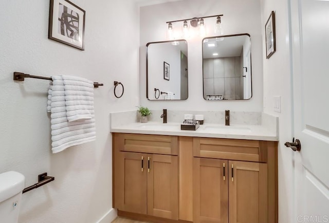3776 Enero Ct, San Diego, CA 92154 - bathroom with double vanity and toilet