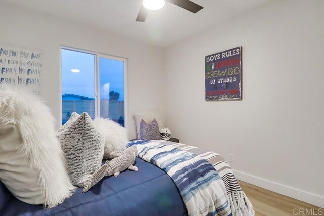 3776 Enero Ct, San Diego, CA 92154 - bedroom with baseboards, wood finished floors, and a ceiling fan