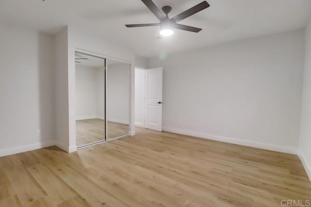 3776 Enero Ct, San Diego, CA 92154 - unfurnished bedroom with light wood-style floors, baseboards, a closet, and ceiling fan