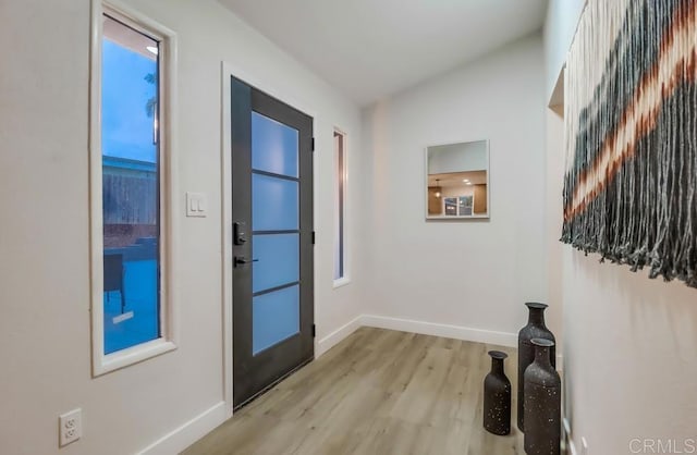 3776 Enero Ct, San Diego, CA 92154 - entrance foyer with light wood-style flooring and baseboards