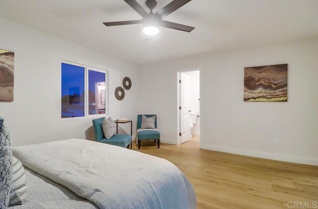 3776 Enero Ct, San Diego, CA 92154 - bedroom featuring light wood-type flooring, baseboards, ensuite bath, and a ceiling fan