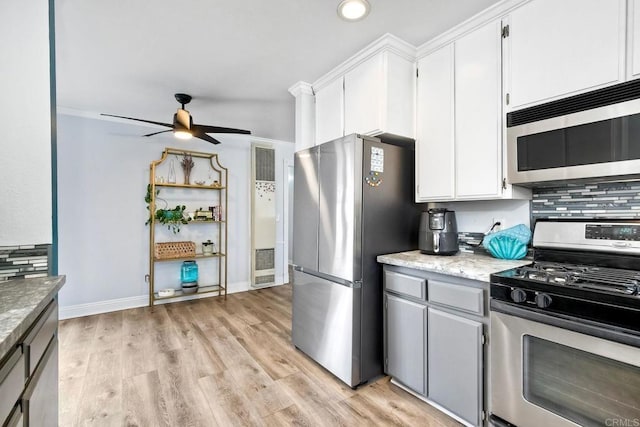 2581 Meadow Lark Dr, San Diego, CA 92123 - kitchen featuring stainless steel appliances, a ceiling fan, light wood-style flooring, decorative backsplash, and recessed lighting