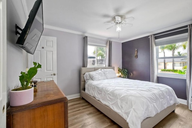 2581 Meadow Lark Dr, San Diego, CA 92123 - bedroom featuring crown molding, light wood finished floors, and ceiling fan