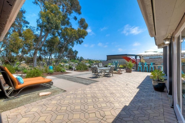 2581 Meadow Lark Dr, San Diego, CA 92123 - view of patio / terrace with outdoor dining space