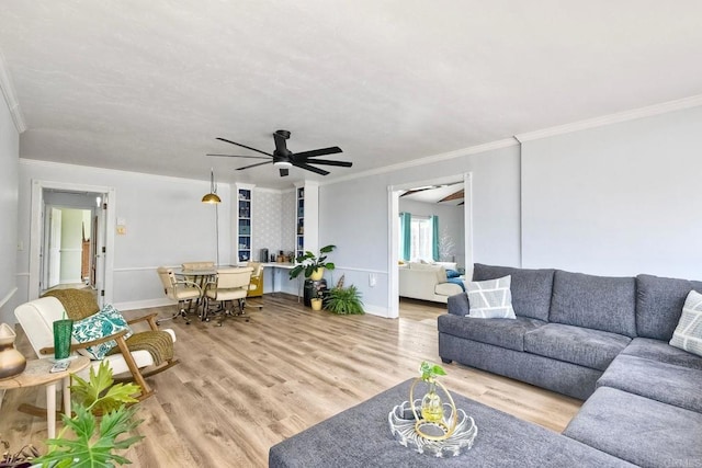 2581 Meadow Lark Dr, San Diego, CA 92123 - living room featuring ceiling fan, crown molding, and wood finished floors
