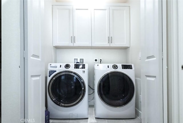 173 Biome, Irvine, CA 92618 - laundry area featuring washer and clothes dryer and cabinet space
