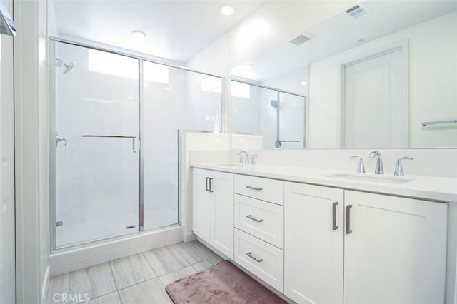 173 Biome, Irvine, CA 92618 - bathroom with double vanity and a stall shower