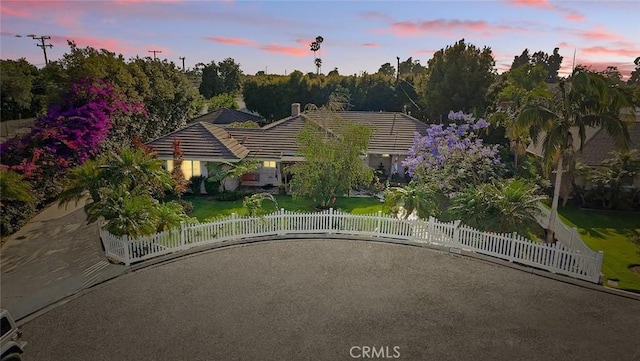 11471 Gill Dr, Garden Grove, CA 92841 - view of front facade featuring a fenced front yard and a tile roof