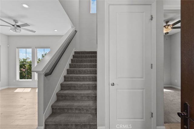 20748 Beech Cir, Porter Ranch, CA 91311 - stairs featuring a ceiling fan, baseboards, recessed lighting, and wood finished floors