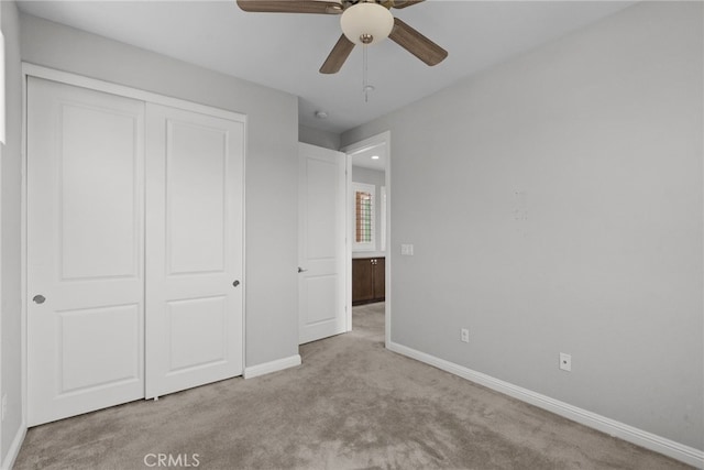 20748 Beech Cir, Porter Ranch, CA 91311 - unfurnished bedroom with carpet floors, baseboards, a closet, and a ceiling fan
