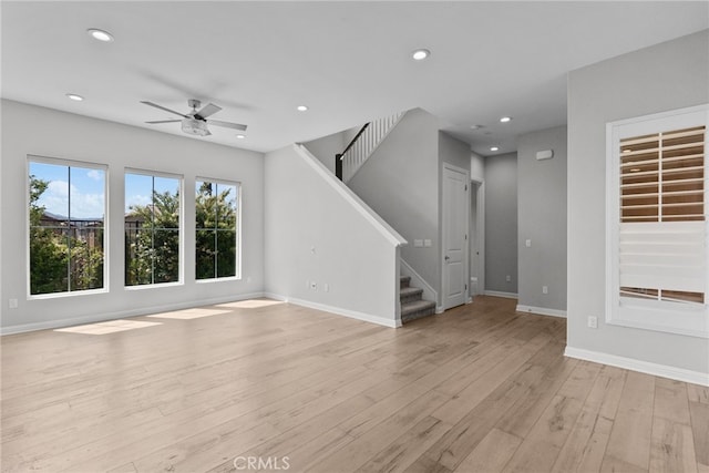 20748 Beech Cir, Porter Ranch, CA 91311 - unfurnished living room with stairs, recessed lighting, ceiling fan, light wood-style flooring, and baseboards
