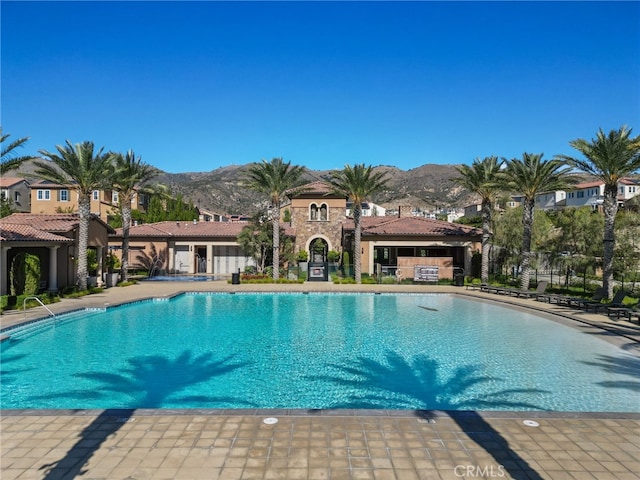 20748 Beech Cir, Porter Ranch, CA 91311 - community pool featuring a mountain view, a gazebo, and a patio