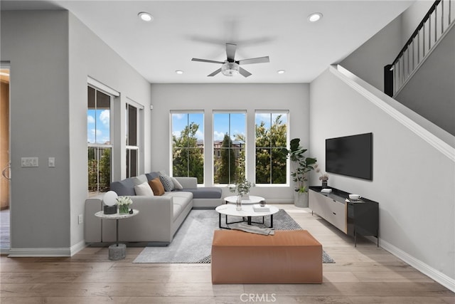 20748 Beech Cir, Porter Ranch, CA 91311 - living area featuring plenty of natural light, light wood-style floors, a ceiling fan, and recessed lighting