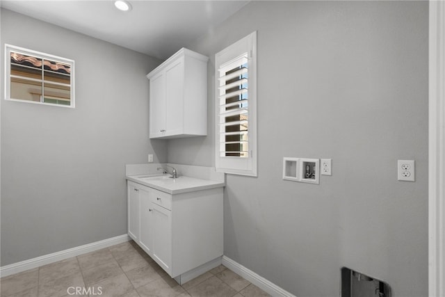 20748 Beech Cir, Porter Ranch, CA 91311 - laundry area featuring hookup for a washing machine, cabinet space, baseboards, recessed lighting, and light tile patterned flooring