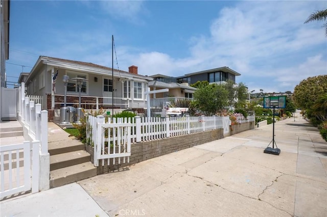 401 6th St, Manhattan Beach, CA 90266 - view of front of home featuring a chimney and covered porch
