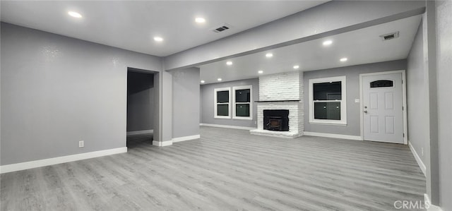 21483 US Highway 18, Apple Valley, CA 92307 - unfurnished living room featuring wood finished floors, recessed lighting, and baseboards