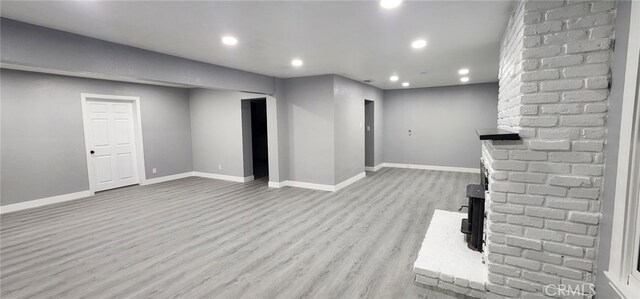 21483 US Highway 18, Apple Valley, CA 92307 - unfurnished living room with light wood finished floors, recessed lighting, and baseboards